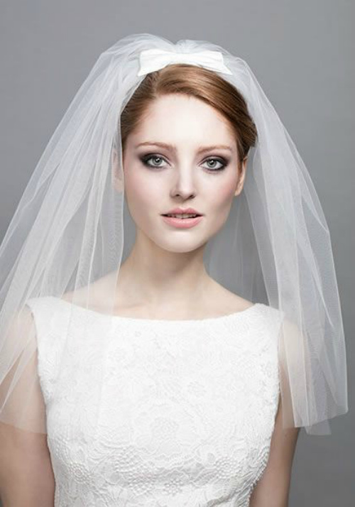 Wedding hairstyles for medium hair with a veil for girls with a round face