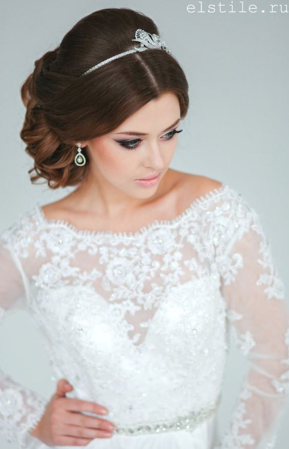 Wedding hairstyles with a tiara on top of the head