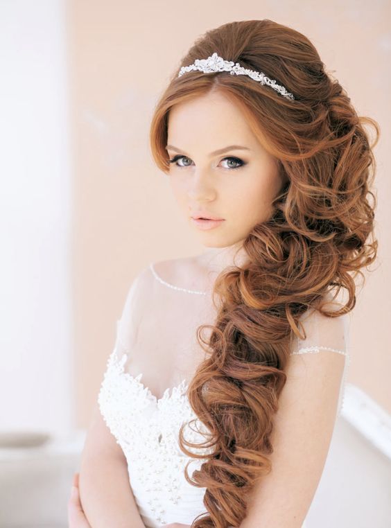 Wedding hairstyles with a tiara on top of the head