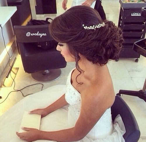 Wedding hairstyles with a tiara on the back