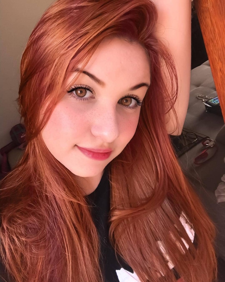 Red hair color with brown eyes