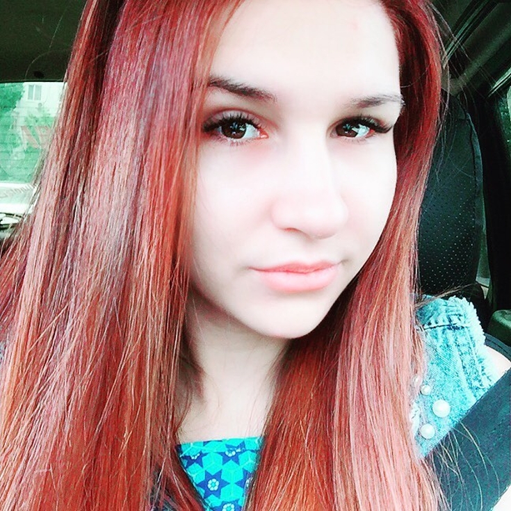 Red hair color with brown eyes