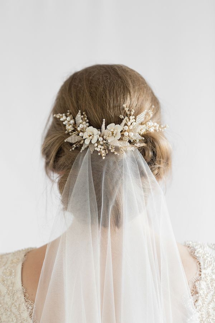 Wedding hairstyles for medium hair with a veil with bangs