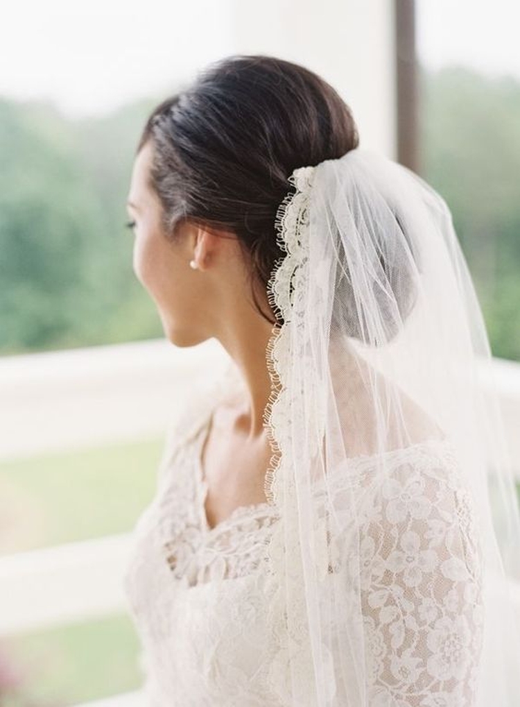 Wedding hairstyles for medium hair with a veil with bangs