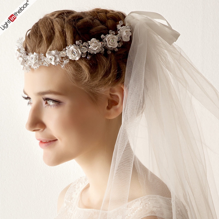 Wedding hairstyles for medium hair with a veil with bangs